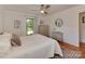 Bedroom with hardwood floors, neutral decor and lots of natural light at 6001 Charing Pl, Charlotte, NC 28211