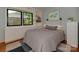 Comfortable bedroom featuring built-in cabinets, a neutral color palette, and natural light at 6001 Charing Pl, Charlotte, NC 28211