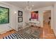 Elegant dining room featuring a modern glass table and stylish chandelier at 6001 Charing Pl, Charlotte, NC 28211