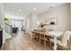Bright and open dining room features a modern table, stylish chairs, and seamless flow to the adjacent spaces at 614 West End Dr, Charlotte, NC 28208