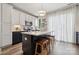 Contemporary kitchen featuring a large center island, sleek cabinetry, stainless appliances, and lots of counterspace at 614 West End Dr, Charlotte, NC 28208