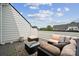 Rooftop patio seating area with comfortable cushions, perfect for outdoor relaxation at 614 West End Dr, Charlotte, NC 28208