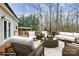 Inviting back deck with ample seating and a wooded view at 642 Brynwood Dr, Rock Hill, SC 29732