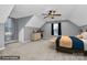 Bright bedroom with vaulted ceilings, ceiling fan, neutral paint, and natural light from two windows at 642 Brynwood Dr, Rock Hill, SC 29732