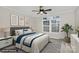 Relaxing bedroom with neutral tones, soft bedding, and natural light from the large window at 642 Brynwood Dr, Rock Hill, SC 29732