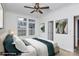 Bright bedroom featuring large windows, neutral walls, and modern ceiling fan at 642 Brynwood Dr, Rock Hill, SC 29732