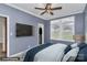 Bedroom with a mounted TV, large windows, and closet at 642 Brynwood Dr, Rock Hill, SC 29732