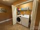 A well-lit laundry room with modern washer and dryer, providing convenience and functionality at 66 Arlington Se Ave, Concord, NC 28025