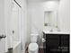 Full bathroom featuring a single vanity and shower-tub combo at 665 Pointe Andrews Dr, Concord, NC 28025