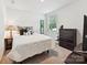 Cozy bedroom featuring carpet, a full bed, and a dresser at 665 Pointe Andrews Dr, Concord, NC 28025