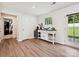 Bright dining area with stylish furnishings, modern decor, and a view of the outdoor space at 665 Pointe Andrews Dr, Concord, NC 28025
