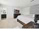 Main bedroom with neutral tones, dresser, tv, and plush carpet at 665 Pointe Andrews Dr, Concord, NC 28025