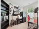 Well lit office featuring carpet, window, desk, safe and guitar at 665 Pointe Andrews Dr, Concord, NC 28025