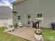 Cozy outdoor patio, complete with a grill and heater, perfect for entertaining guests at 665 Pointe Andrews Dr, Concord, NC 28025