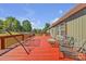 Spacious back deck with outdoor seating, ideal for enjoying the surrounding nature at 725 Hunters Ridge Rd, Taylorsville, NC 28681
