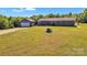 Charming single story home with detached garage and spacious green front yard at 725 Hunters Ridge Rd, Taylorsville, NC 28681