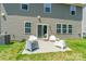 Spacious backyard with a patio, perfect for outdoor gatherings and relaxation at 7711 Kelburn Ln, Charlotte, NC 28273
