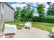 Well-maintained backyard patio with chairs, providing a cozy outdoor living space at 7711 Kelburn Ln, Charlotte, NC 28273