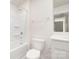 Bathroom featuring a shower-tub combo, neutral walls, and a modern toilet at 822 N Naughton St, Chester, SC 29706