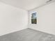 Spare bedroom with a window and neutral paint at 822 N Naughton St, Chester, SC 29706