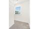 Walk-in closet with adjustable shelving and natural light from a window at 822 N Naughton St, Chester, SC 29706