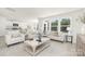 Bright open-concept living room with lots of natural light and modern furnishings at 822 N Naughton St, Chester, SC 29706