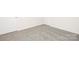 Empty room showing neutral walls and carpet at 822 N Naughton St, Chester, SC 29706