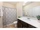 Bathroom with a shower, a single vanity, a toilet and a decorative shower curtain at 8853 Brakeman Dr, Waxhaw, NC 28173