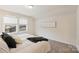 Bright bedroom featuring natural light and neutral walls and plush carpeting at 8853 Brakeman Dr, Waxhaw, NC 28173