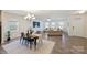 Open dining and living area features modern decor, hardwood floors, and an abundance of natural light at 8853 Brakeman Dr, Waxhaw, NC 28173