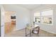 Bright office with a work desk, carpet, and natural light from two windows at 8853 Brakeman Dr, Waxhaw, NC 28173