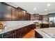 Elegant kitchen with granite countertops, stainless steel appliances, and ample cabinet storage at 9301 Swimming Dr, Harrisburg, NC 28075