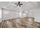 Spacious bedroom with tray ceilings, fan, and lots of natural light from multiple windows at 9647 Laurie Nw Ave, Concord, NC 28027