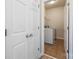 This is a laundry room with a washer and dryer that are white with tile flooring at 9647 Laurie Nw Ave, Concord, NC 28027