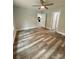 This bedroom features hardwood floors, neutral walls, and doorways to other rooms in the home at 1050 Beaten Path Rd, China Grove, NC 28023