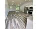 Modern open-concept design with vaulted ceilings, stainless steel appliances, and granite counters at 1050 Beaten Path Rd, China Grove, NC 28023