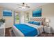 Bedroom features neutral walls, white trim, and two windows for ample light at 10749 Kingsview Dr, Davidson, NC 28036