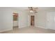 Spacious bedroom with neutral carpet, open doorways, and visible ensuite bathroom at 110 Synandra Dr # B, Mooresville, NC 28117