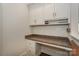 Office nook features granite countertops, drawers and cubbies, plus multiple electrical outlets at 110 Synandra Dr # B, Mooresville, NC 28117