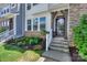 Inviting townhome exterior with well-manicured landscaping and a welcoming entrance at 110 Synandra Dr # B, Mooresville, NC 28117