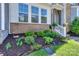Well-maintained front yard featuring lush greenery and fresh mulch at 110 Synandra Dr # B, Mooresville, NC 28117