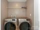Laundry room featuring newer Samsung washer and dryer at 110 Synandra Dr # B, Mooresville, NC 28117