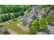 Overhead view of home and private backyard oasis with pool and mature trees at 11333 Preservation Ln, Charlotte, NC 28278
