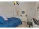 Bright bedroom showcasing a white dresser and a keyboard, creating a cozy space at 11333 Preservation Ln, Charlotte, NC 28278