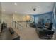 Large bonus room featuring theater seating at 11333 Preservation Ln, Charlotte, NC 28278