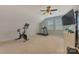 Large bonus room featuring workout equipment including a treadmill and exercise bike at 11333 Preservation Ln, Charlotte, NC 28278