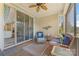 Inviting screened porch featuring cozy seating and views, perfect for relaxation and entertaining at 11333 Preservation Ln, Charlotte, NC 28278