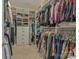 Walk-in closet with custom shelving and ample storage space at 11333 Preservation Ln, Charlotte, NC 28278