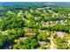 Aerial shot features home at 1154 Doby Ct amid a lush, green landscape and nearby golf course at 1154 Doby Ct, Fort Mill, SC 29715