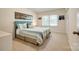 Cozy bedroom with neutral carpet, bright windows, and closet space at 1154 Doby Ct, Fort Mill, SC 29715